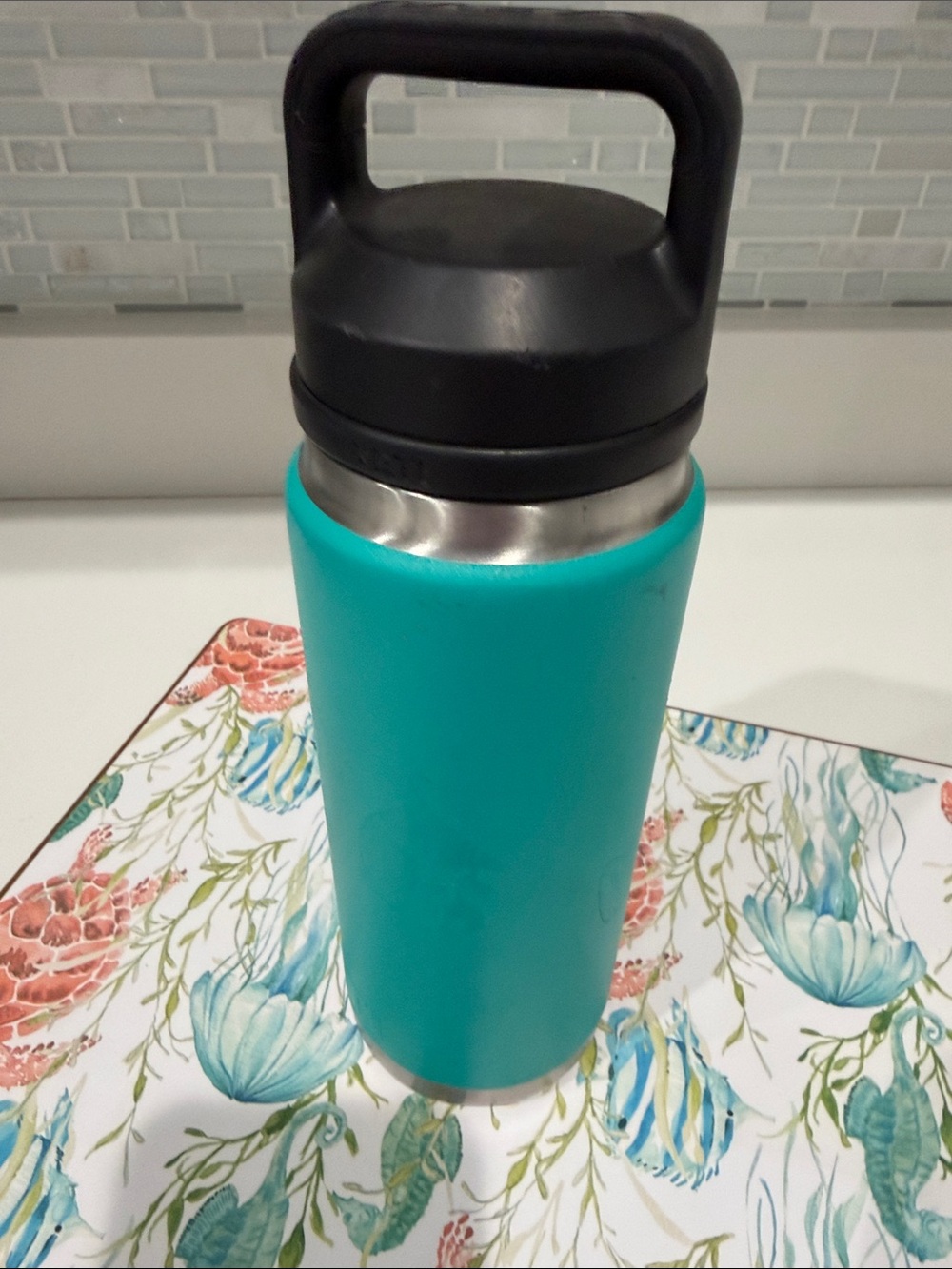 Yeti Turquoise Vacuum Insulated Bottle with Black Handle Lid